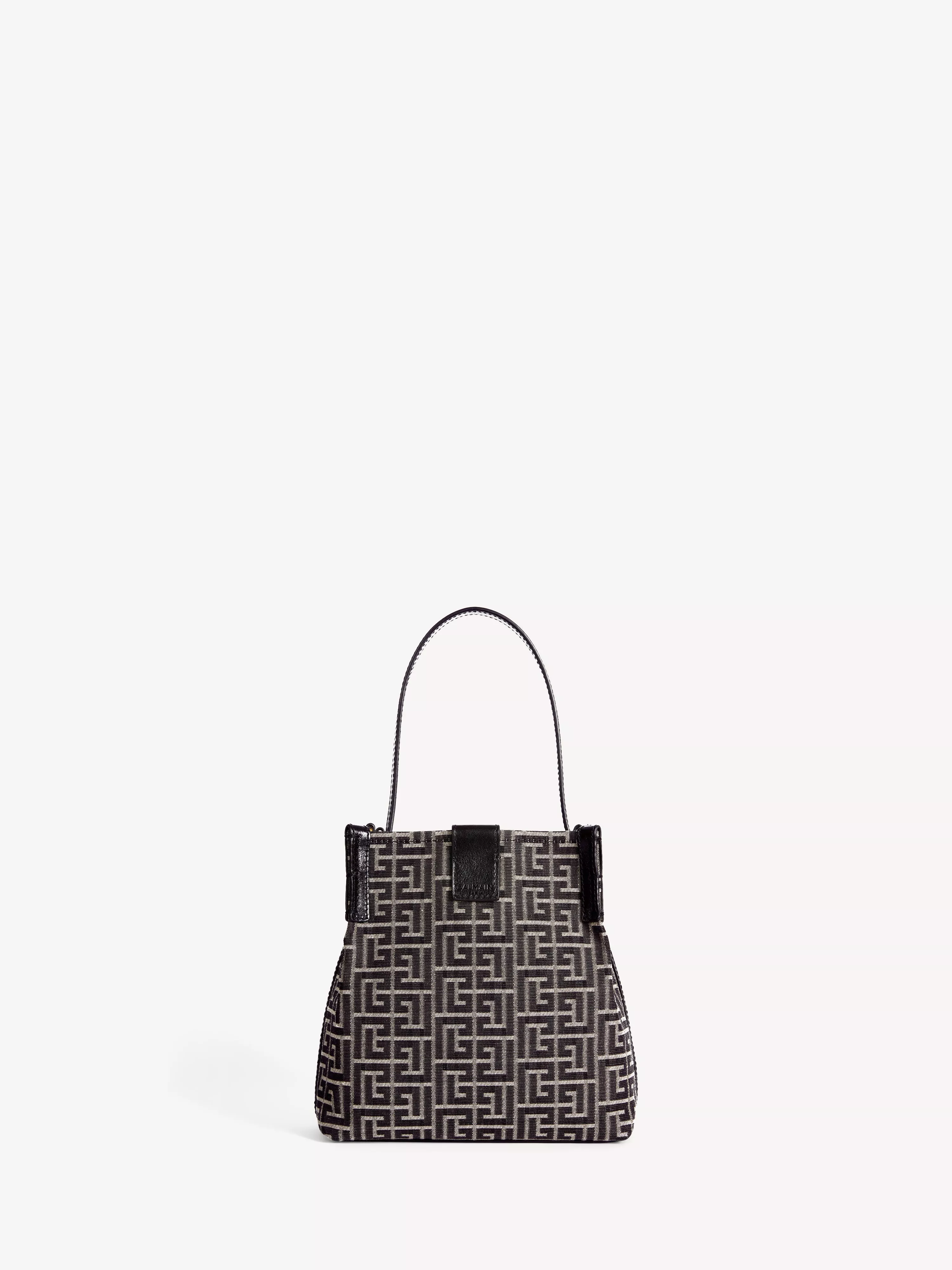 Release Bucket bag in jacquard and calfskin